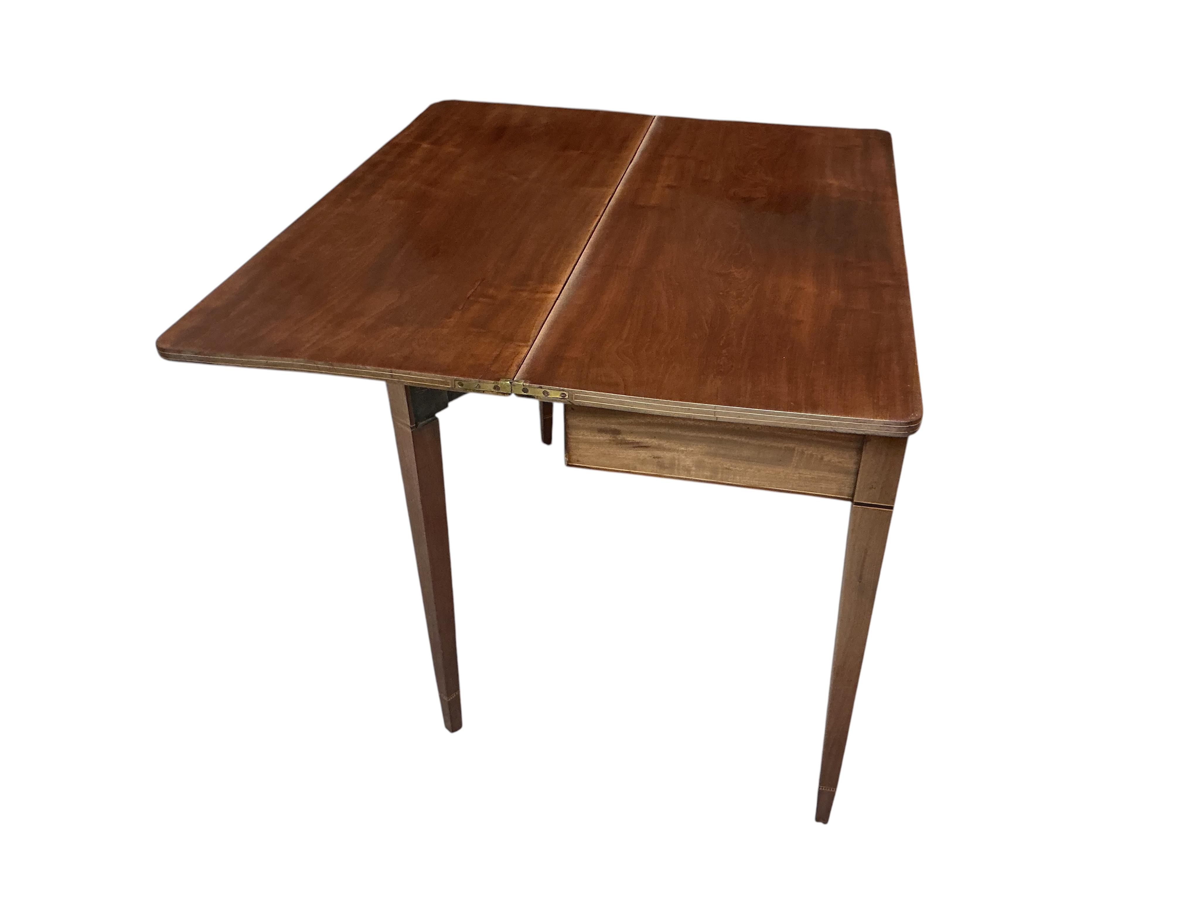 A George III rectangular mahogany folding tea table, width 101cm, depth 43cm, height 72cm